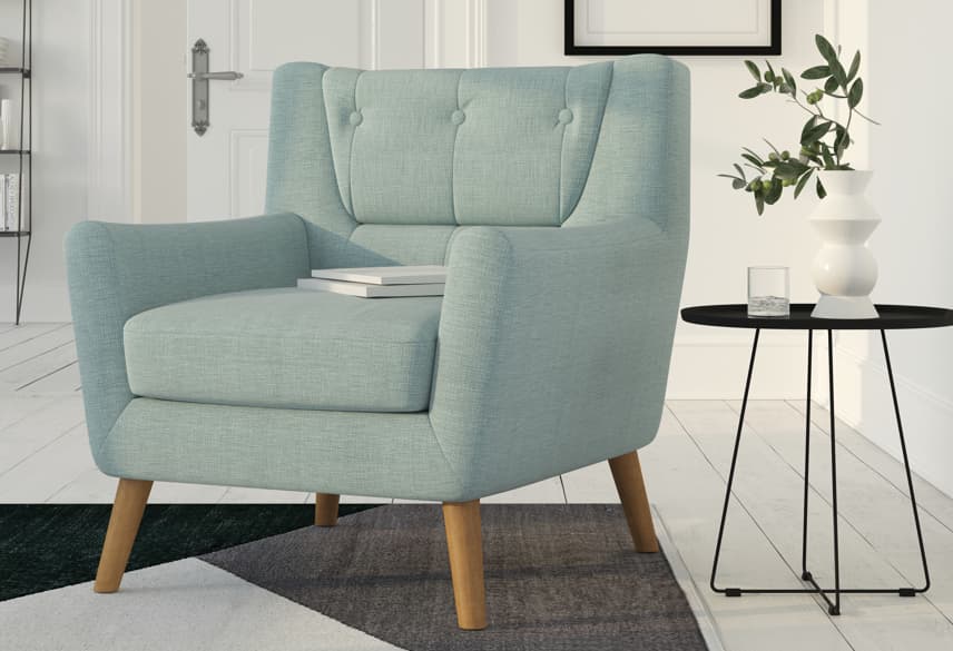 Tufted lounge armchair with wooden legs for modern hotel suites