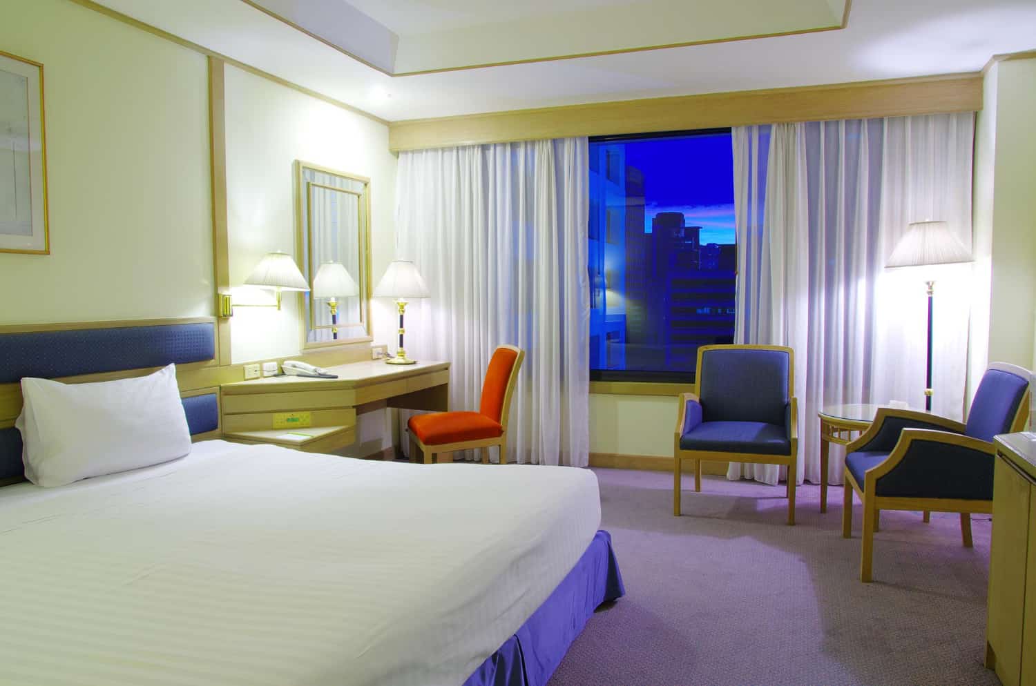 Hotel furniture products — complete guest room set including bed, headboard, desk, chairs and seating area