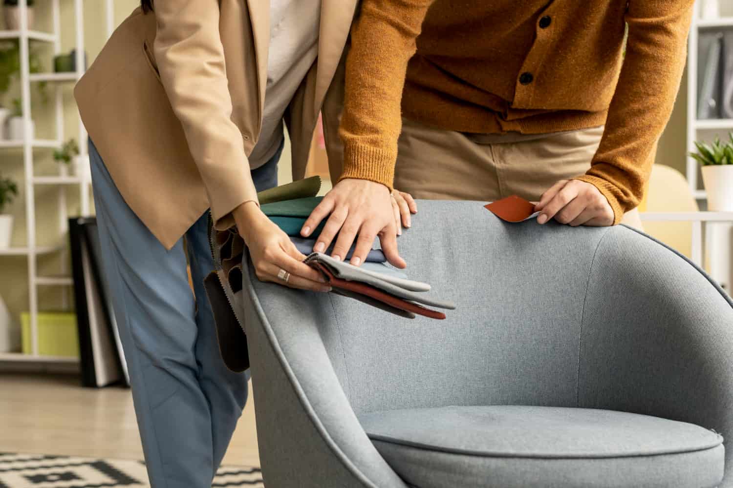 Hotel furniture suppliers — fabric sample evaluation on upholstered chair during supplier selection process