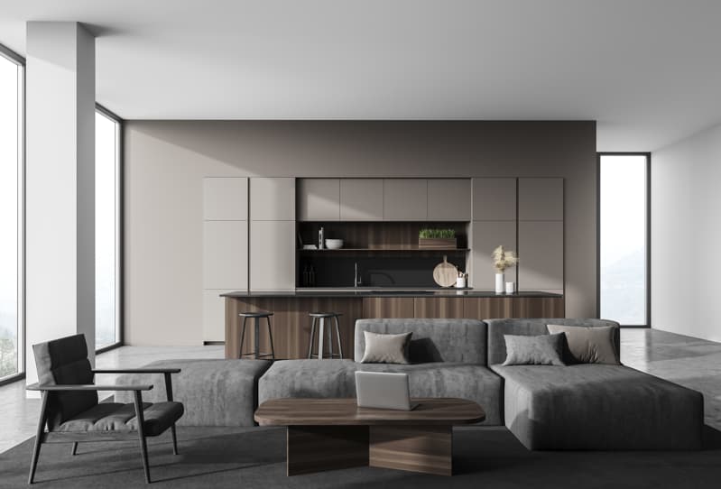 Modern hotel suite sofa with coffee table and soft neutral tones