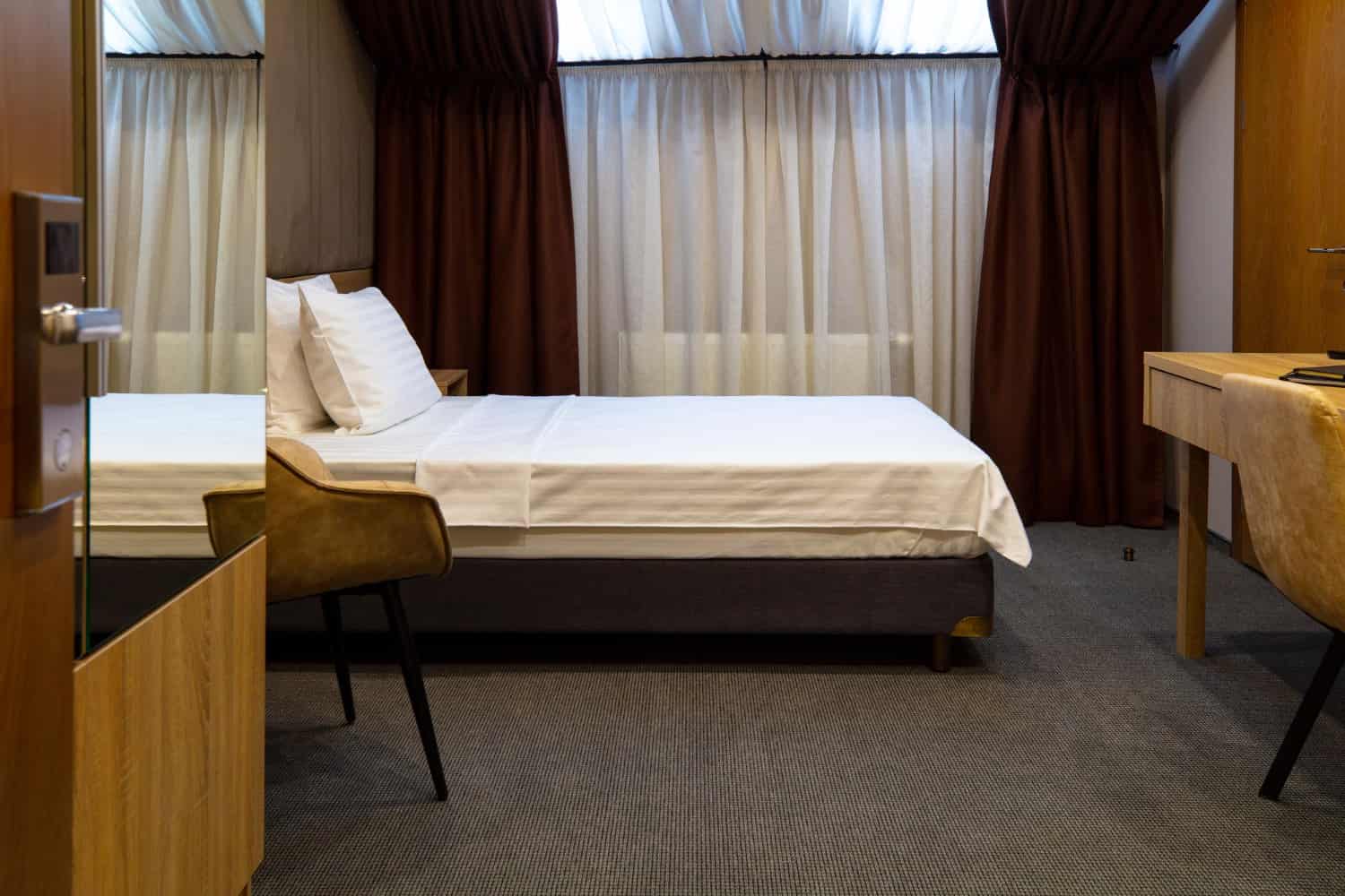 hotel furniture for new hotel projects Ghana guest room bed desk and chair setup