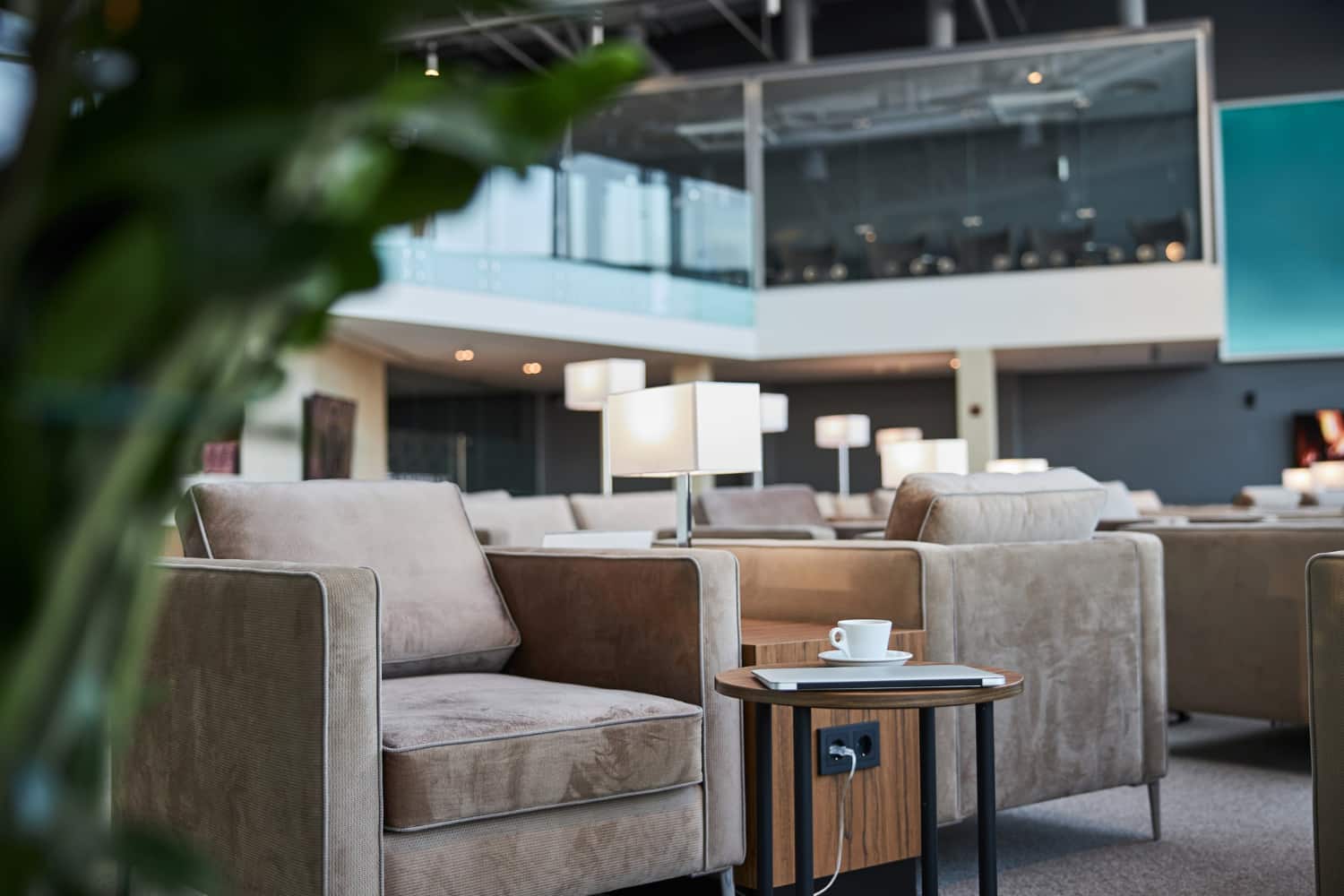 Hotel furniture suppliers Turkey — contract-grade lobby armchairs and side table in hotel lounge setting