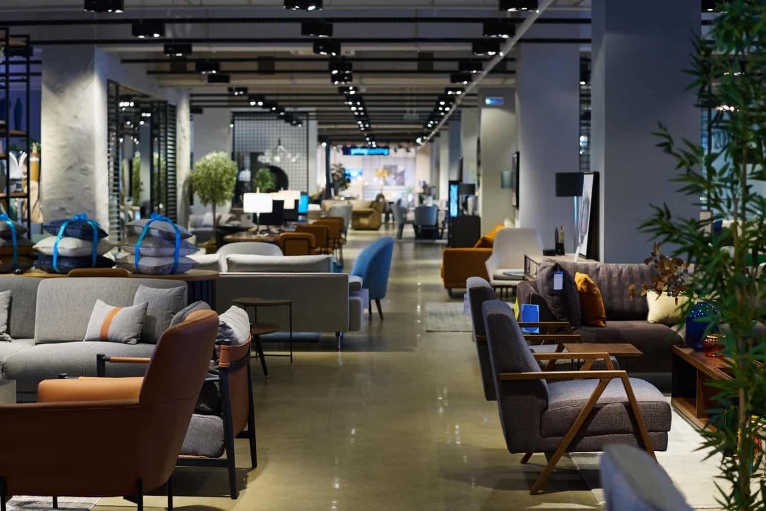 Hotel furniture suppliers Turkey — large showroom displaying contract seating, sofas and lounge chairs for hotel projects